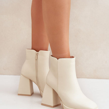 Heel boots Step in style