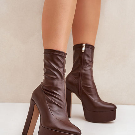 Heel boots Step in style