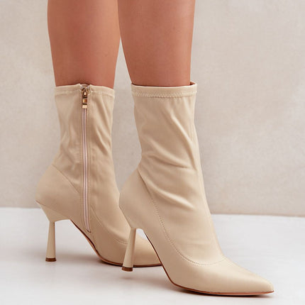 Heel boots Step in style