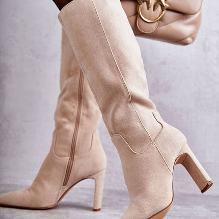 Heel boots Step in style